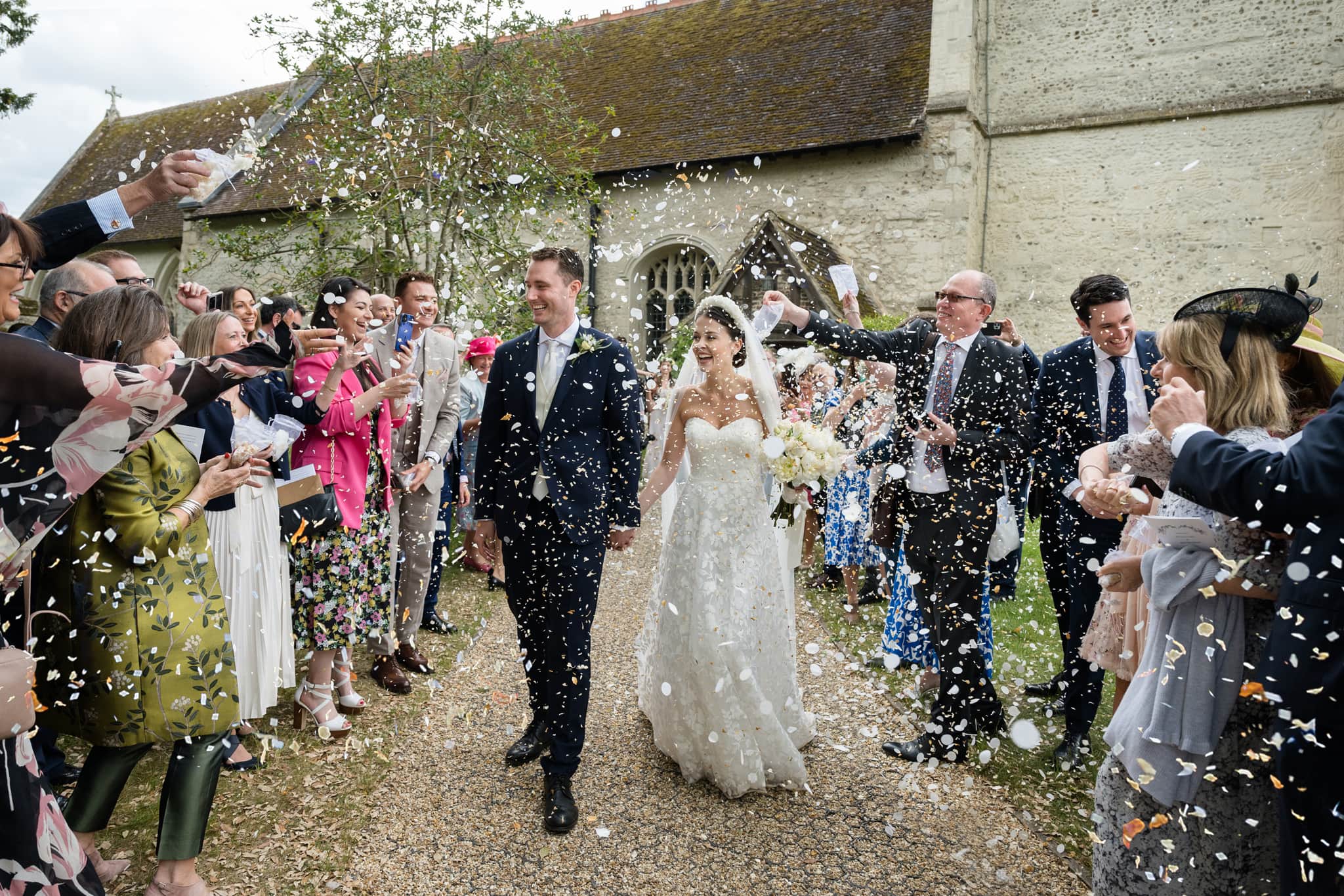 Confetti being thrown at Grantchester church