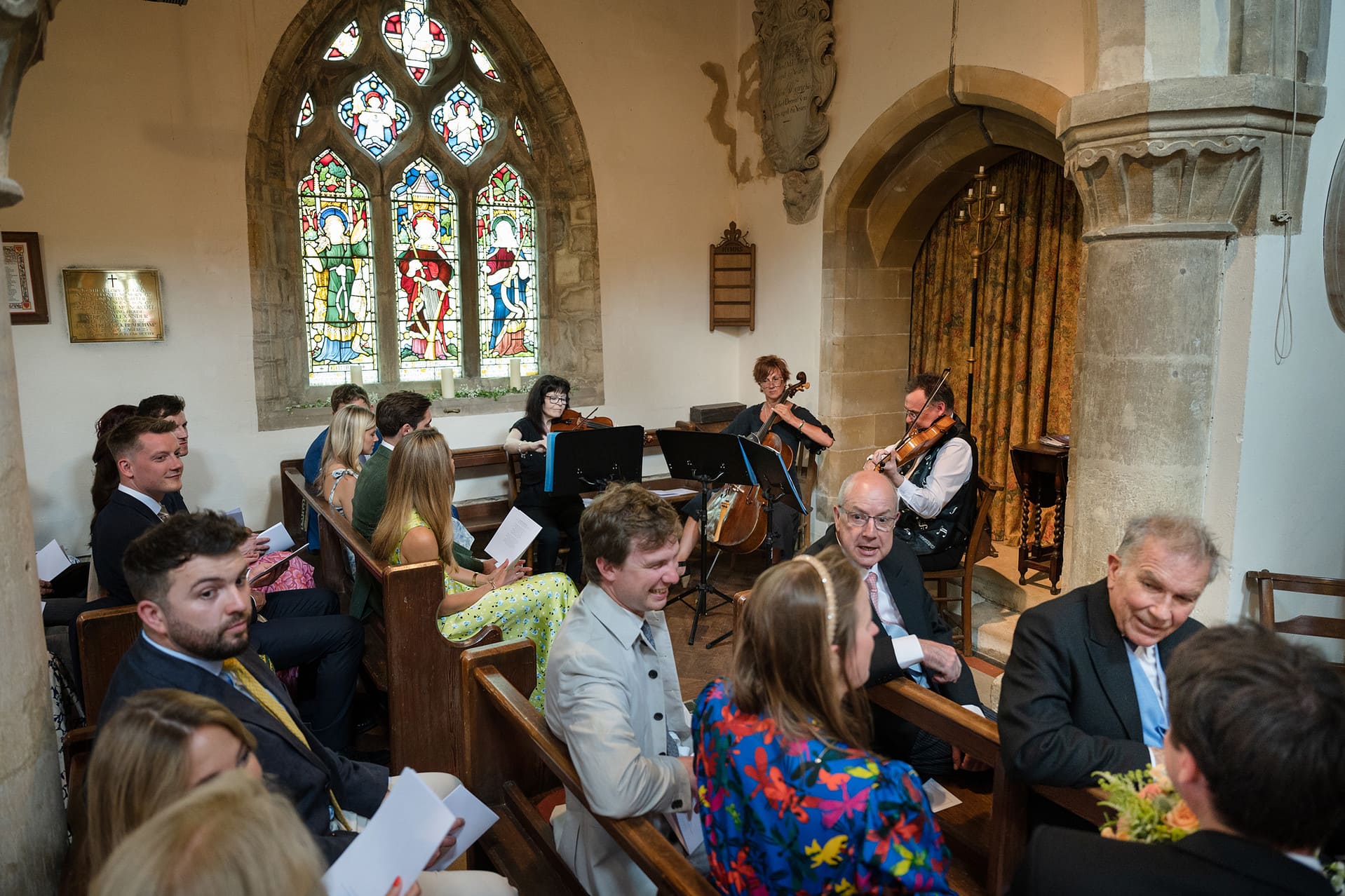 A string quartet playing during the signing of the register at Wing church in Rutland