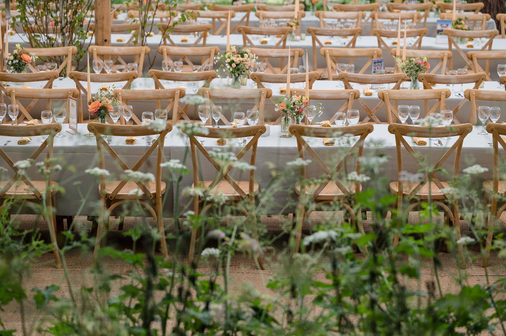 Rows of long tables set for a wedding breakfast