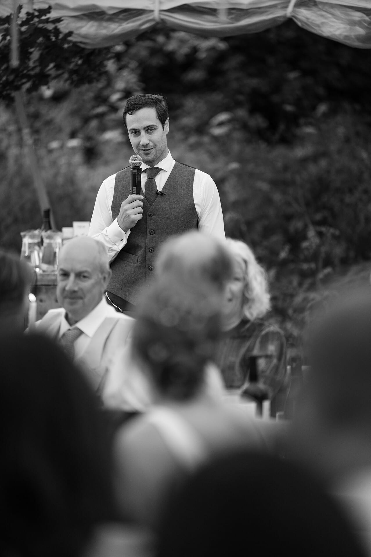 The groom talking directly to the bride during his speech