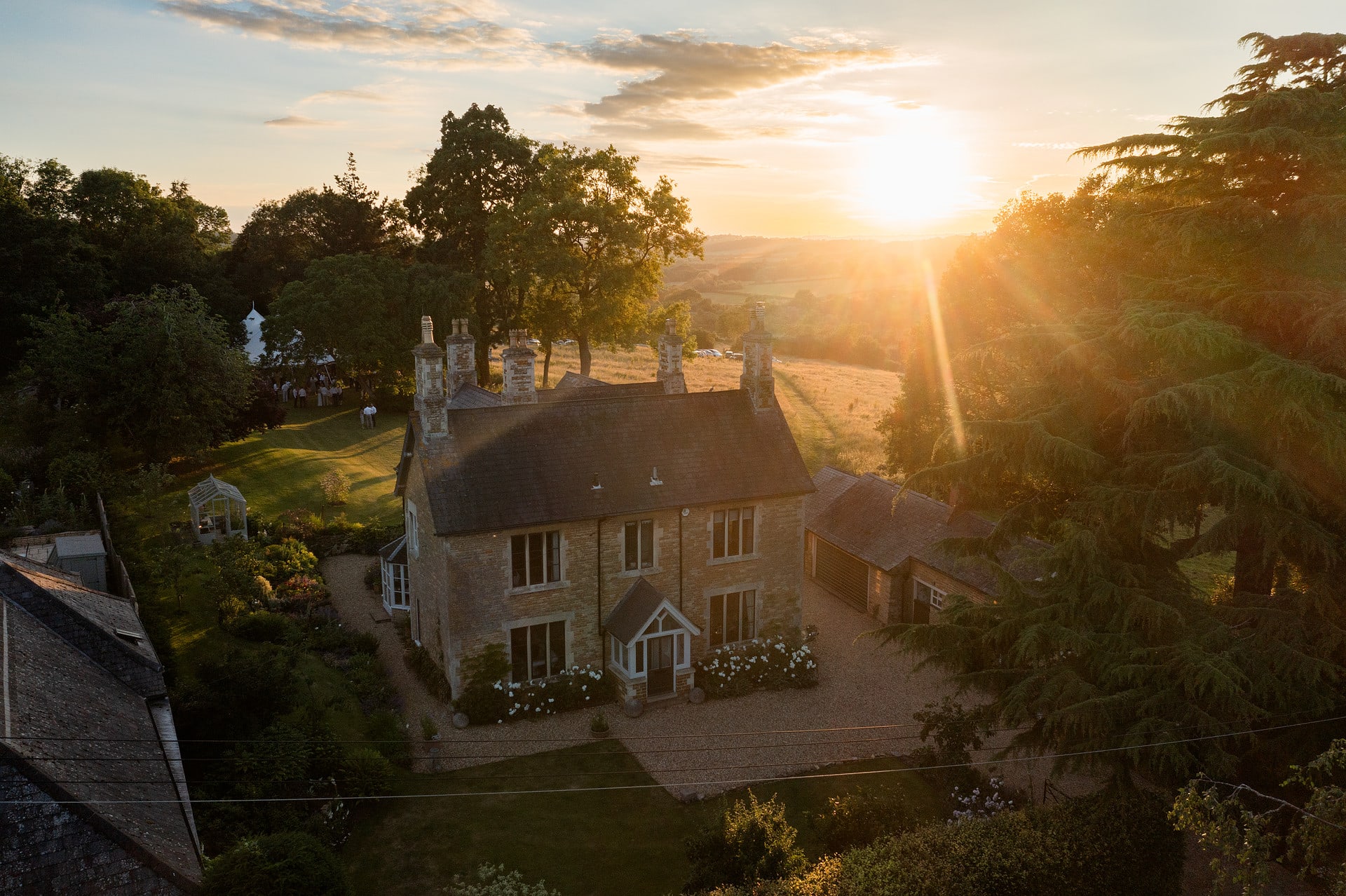 A country house in Rutland with the sun setting behind