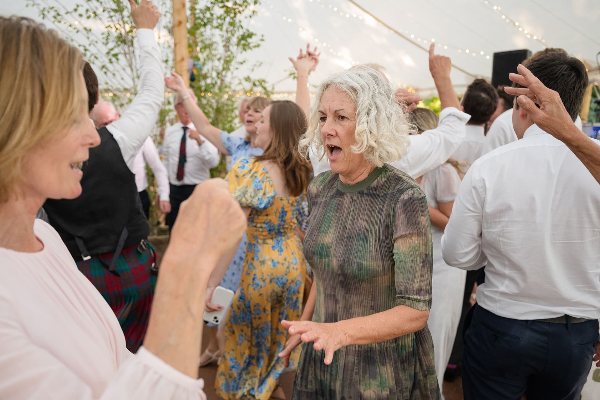 Wedding guests dancing