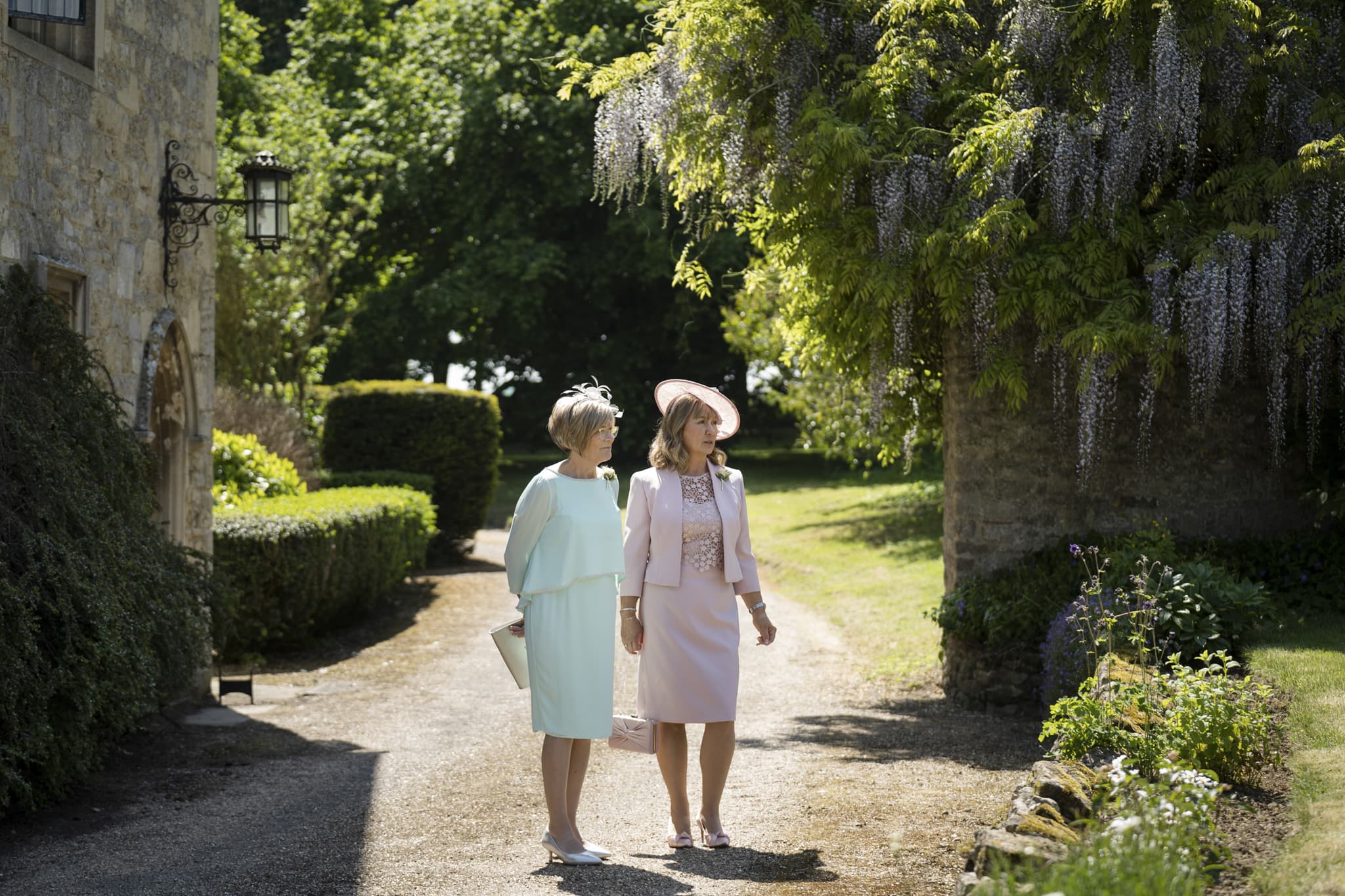 The bride and groom's mums ready in their outfits before the wedding ceremony at Notley Abbey