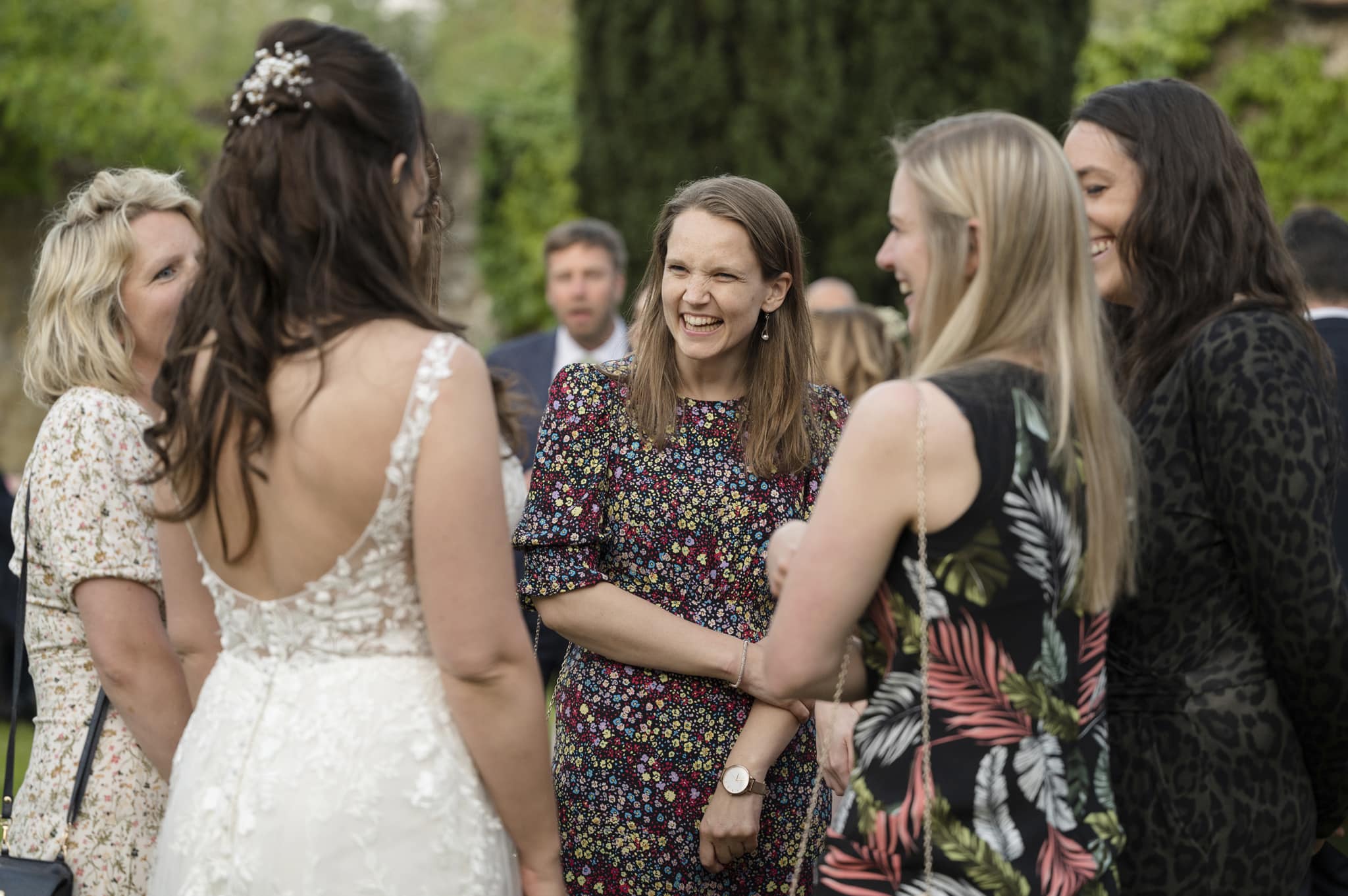 Wedding guests chatting outside after dinner